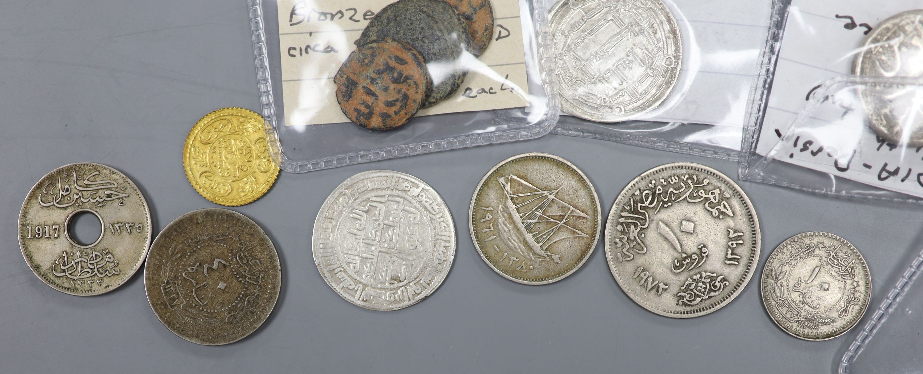 A group of Islamic coins to include